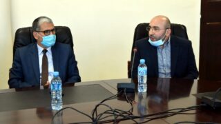 Installation du Professeur AOUDIA Sofiane, nouveau Doyen de la Faculté des Sciences Exactes 55 de gauche à droite: M. BOUKERROU Mouloud, SG de l’université de Bejaia , Pr AOUDIA Sofiane, doyen de la faculté des sciences exactes de l’université de Bejaia